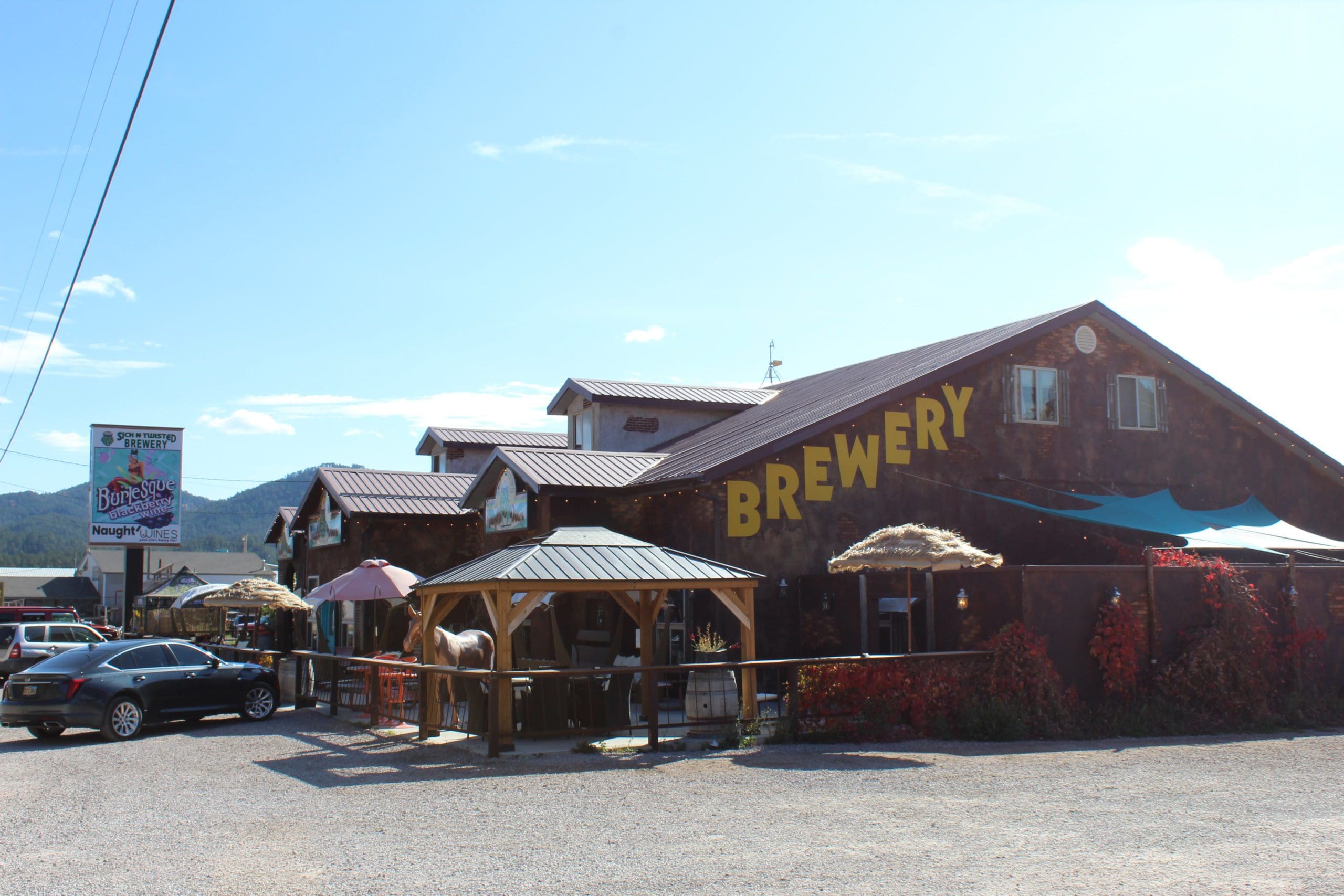 Angled view of Sick N Twisted Brewery and Naughti Wines Store front